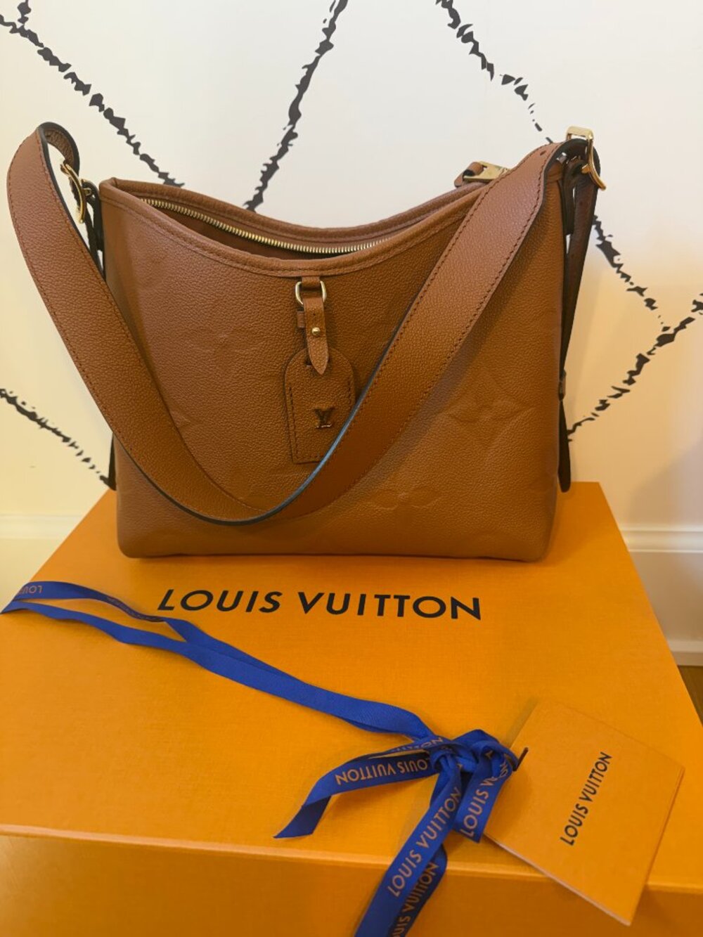 LV CarryAll PM: Cognac Monogram Empreinte Leather